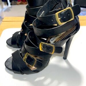 Pre- owned, STEVE MADDEN scrappy, caged, black sandal with gold buckles. 4.5”